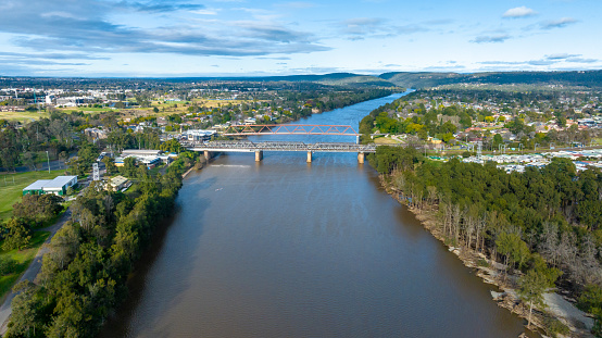 Drone aerial photograph of the Victoria Bridge on the Nepean River during flooding in Penrith in New South Wales in Australia