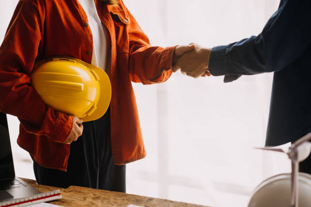 istock Construction and structure concept of engineer working drawing on blueprint meeting for project working with partner on model building and engineering tools in working site, construction concept 1756380071