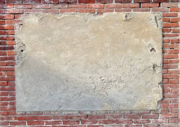 istock old partially plastered brick wall as a background or business card 1756397021