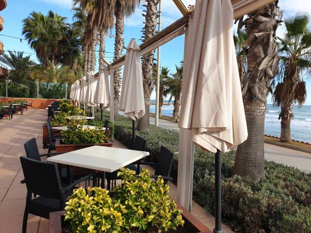 istock Empty summer cafe terrace with sea views, Sitges, Spain 1756404071