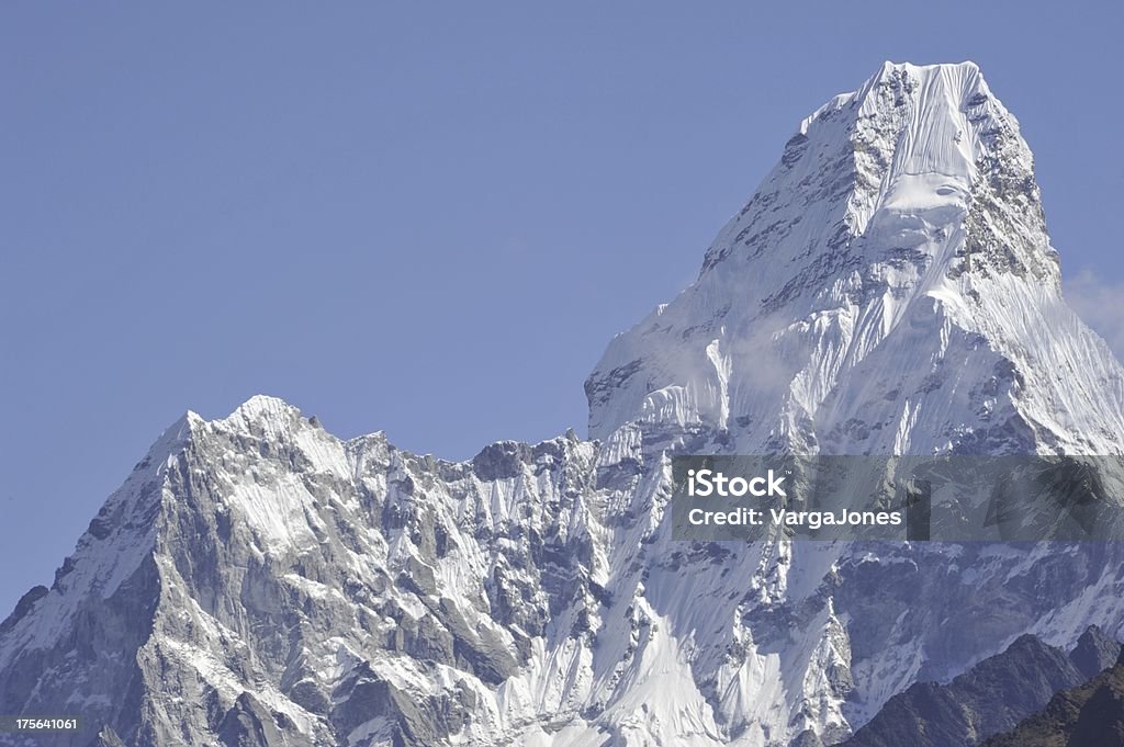 Mountain Peak A snow covered mountain peak of the Khumbu Region, Nepal Asia Stock Photo