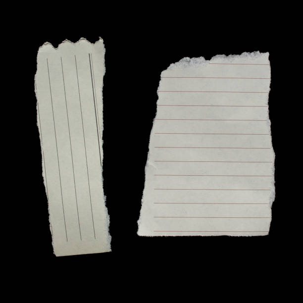 istock Ripped paper piece on isolated black background 1756411651