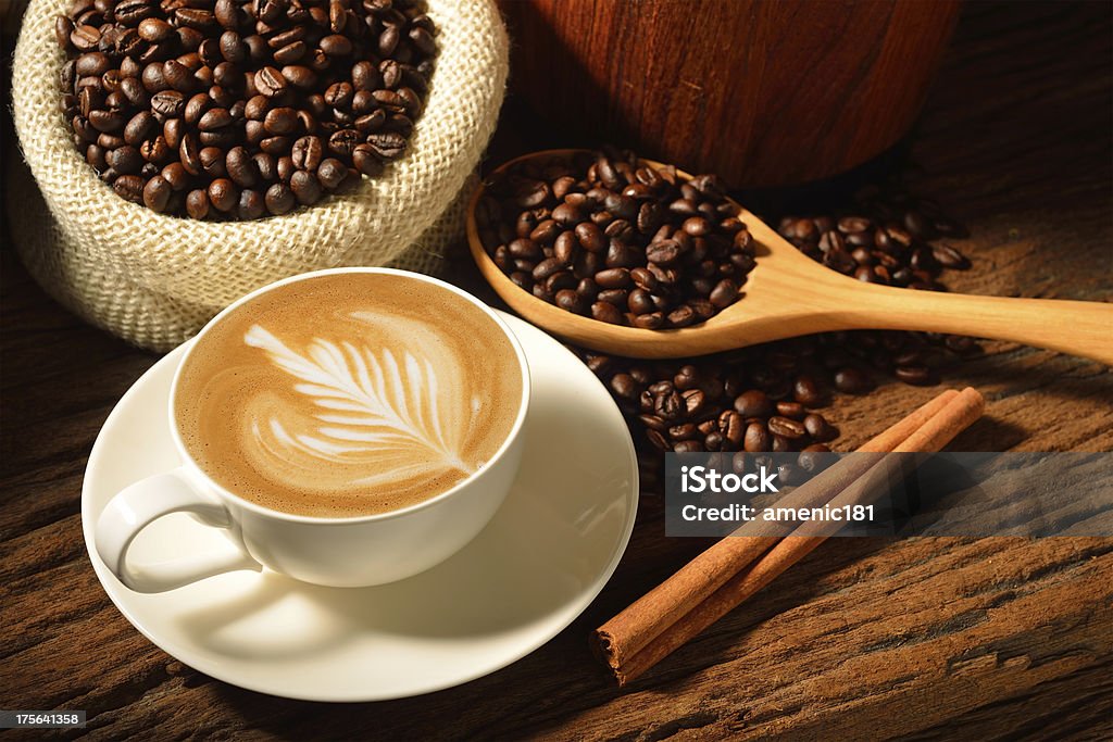 coffee A cup of cafe latte and coffee beans Backgrounds Stock Photo