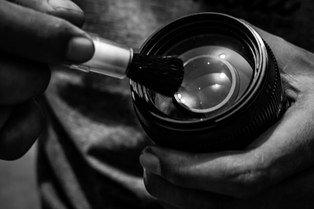 istock Clean the camera lens with a brush 1756430686