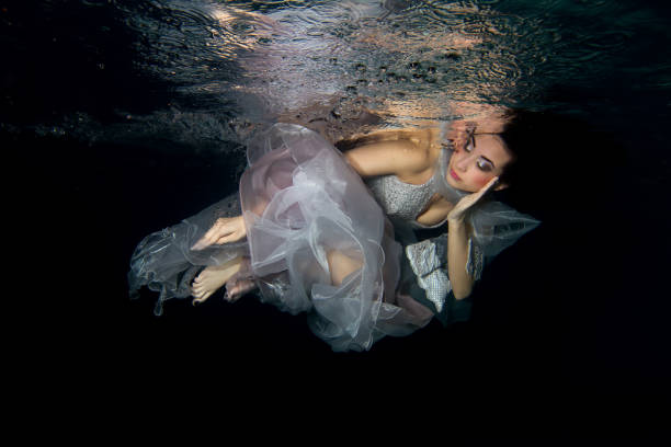 istock Underwater Sleeping in Gray or Silver Dress 1756430707