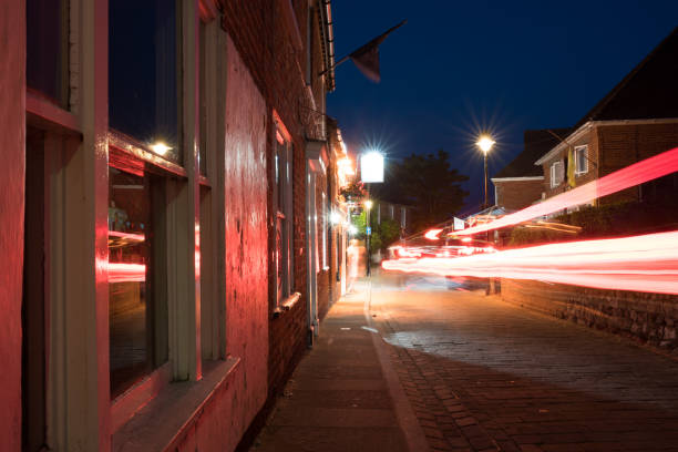 istock Light Trails Through Old Streets in Hamble, Southampton 1756431600