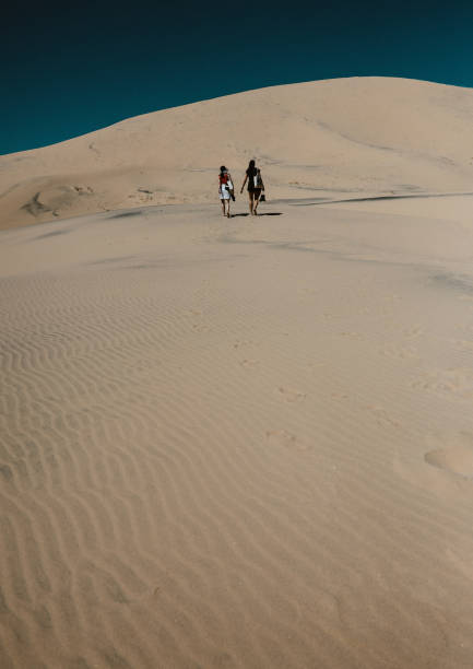 istock female friends exploring Mojave desert 1756444459