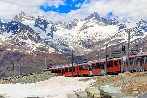 Beautiful view of the Swiss Alps with cogwheel train of Gornergrat railway close to Zermatt, Switzerland
