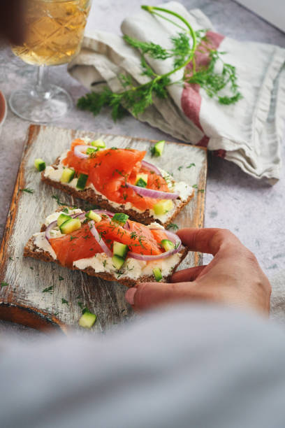 istock Salmon with Cottage Cheese and Cucumber on Toasted Bread 1756456145