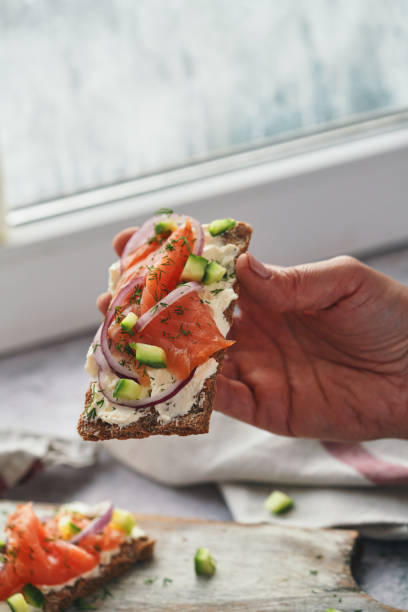 istock Salmon with Cottage Cheese and Cucumber on Toasted Bread 1756456152