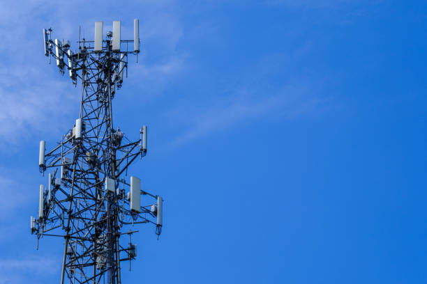 istock The top portion of a cellular antenna tower against a blue sky 1756464019