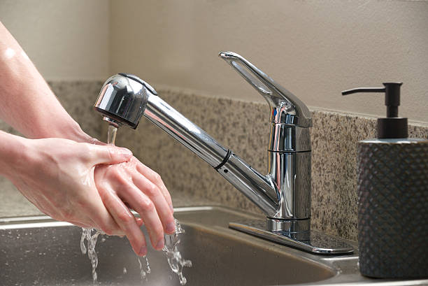 istock Washing hands in the kitchen sink 175646969