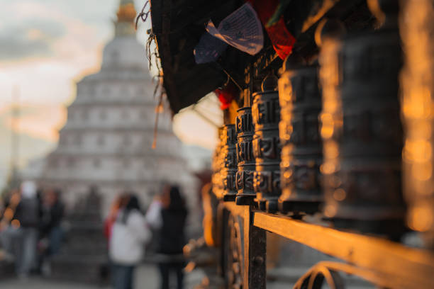 Sun lit praying wheel in Buddhist temple in Kathmandu, Nepal