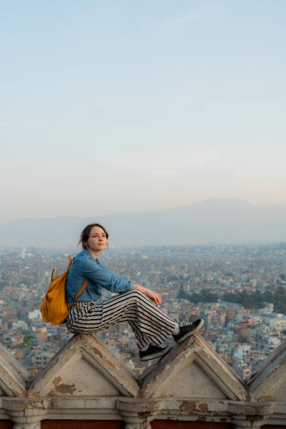 istock Woman sitting overlooking Kathmandu cityscape 1756473697
