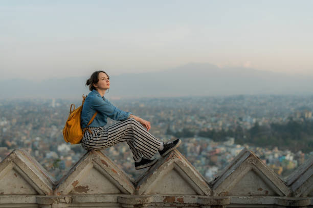 istock Woman sitting overlooking Kathmandu cityscape 1756473735