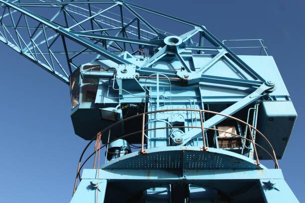 istock industrial crane against blue sky 1756493183