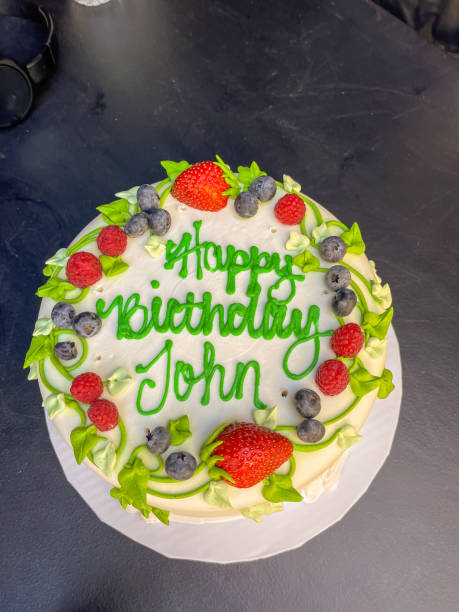 istock A birthday cake with strawberries and blueberries that 1756493728