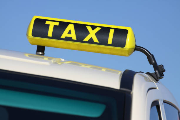 istock German taxi sign against blue sky 1756496034