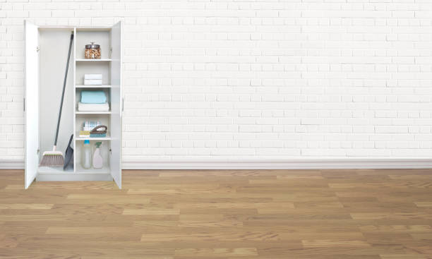 istock Cabinet with cleaning supplies in an empty laundry room 1756508123