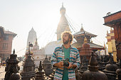 Man photographing in monkey temple in Kathmandu