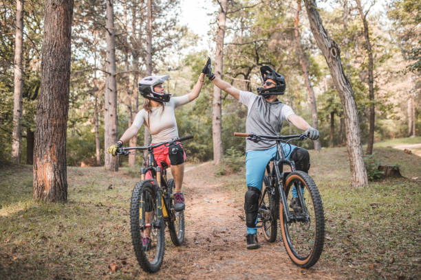 istock During a mountain bike ride, two best friends high-five each other 1756533711