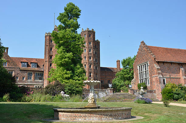 istock Elizabethan mansion with tower and house 175655117