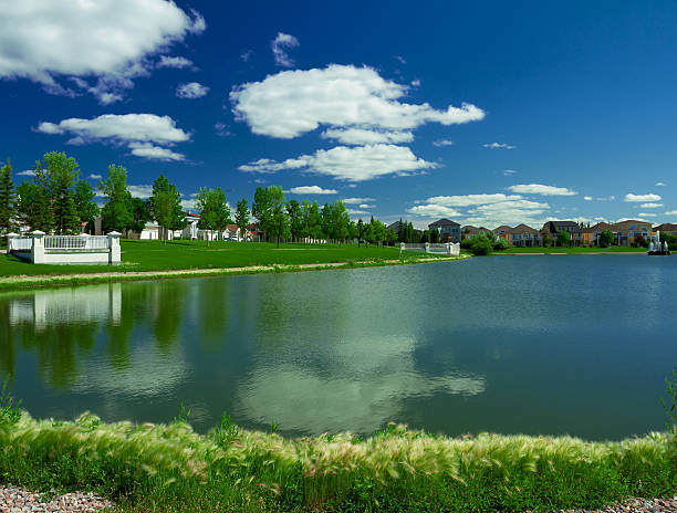 Residential district at the outskirts of the city of Tsawwassen, a town of cottages at a picturesque location, cottages stand among ponds and colorful flower beds
