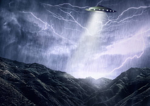 Alien, spaceship and UFO with lightning on mountain for fantasy, science fiction and space abduction. Extraterrestrial, travel and flying saucer beam in rain for galaxy discovery, mystery and galaxy