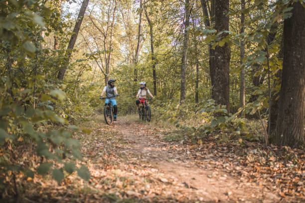istock Two people enjoy a mountain bike downhill adventure 1756580379