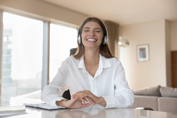 istock Woman looks at screen have webcam virtual online conference talk 1756587941