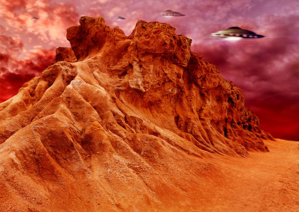 istock UFO, invasion and spaceship in outer space on mars and planet with science fiction. Alien technology, flying saucer and red mountain landscape with surreal background and world with spacecraft in sky 1756590152