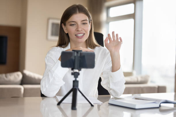 istock Attractive woman staring at cellphone screen start streaming 1756595672