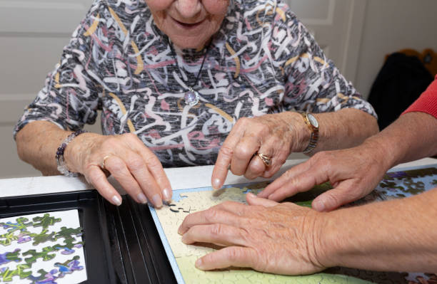 istock Senior Women making Puzzle at Home 1756596308