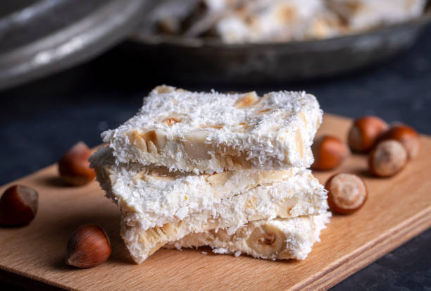 istock Traditional delicious Turkish dessert; cezerye with hazelnuts and coconut (Turkish name; Findikli madonna) 1756607660