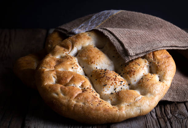istock Ramadan Pita (Turkish name; Ramazan Pidesi) Traditional Turkish bread for holy month Ramadan 1756614764