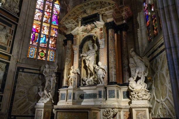 istock Religious statues and stain glass windows within the Milan Cathedral 1756626279