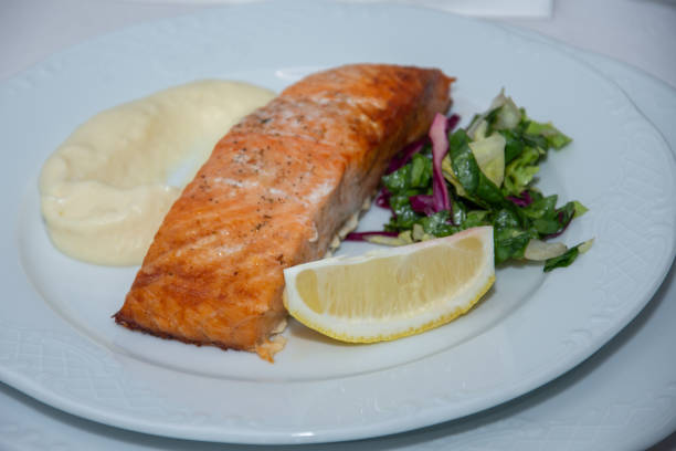 istock Salmon salad with lemon and sauce 1756638455