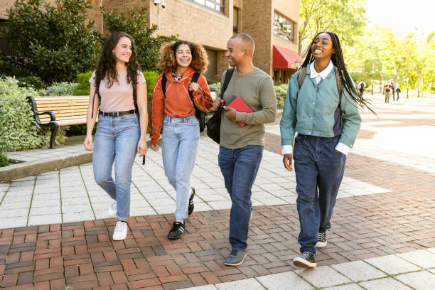 istock Group of diverse students arrive at University Campus 1756688416
