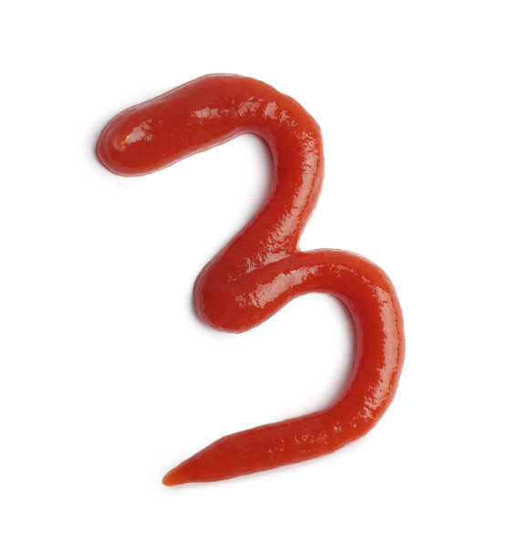 istock Number 3 written with ketchup on white background 1756709571