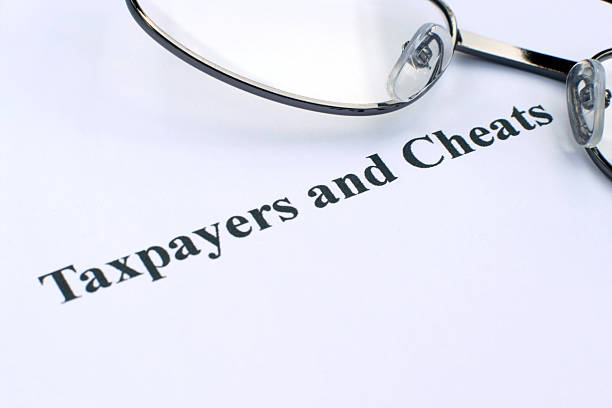 istock Taxpayers and cheats 175671596