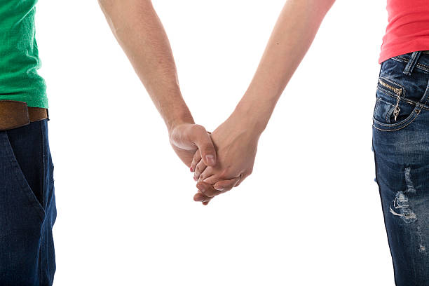 istock Young couple  holding hands on white Background 175673989