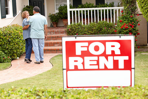 istock A senior couple inspecting a potential house rental 175676753