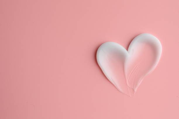 istock Sample facial cream on pale pink background, top view. Space for text 1756776056