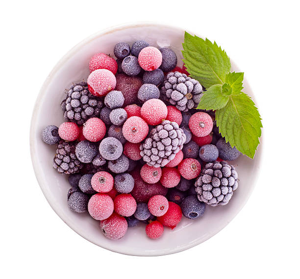 Frozen blackberries and blueberries with a mint garnish
