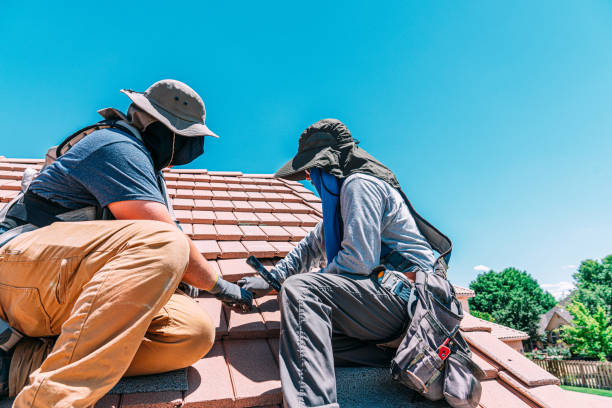 istock Two Men Working Together Preparing a a Clay Roof for Solar Panels 1756777711