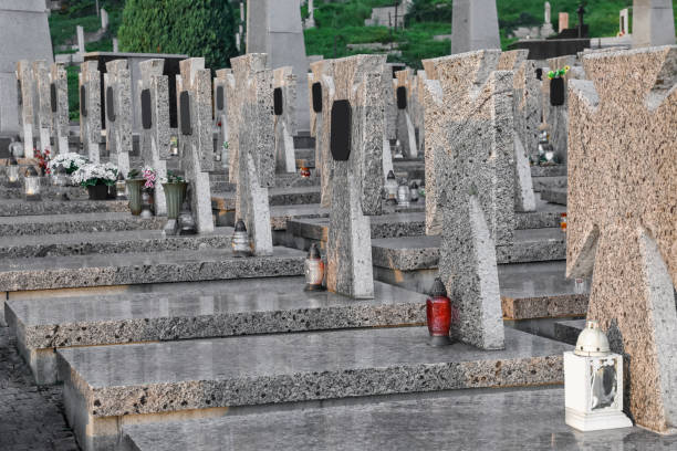 istock Many granite tombstones on cemetery. Funeral ceremony 1756784090