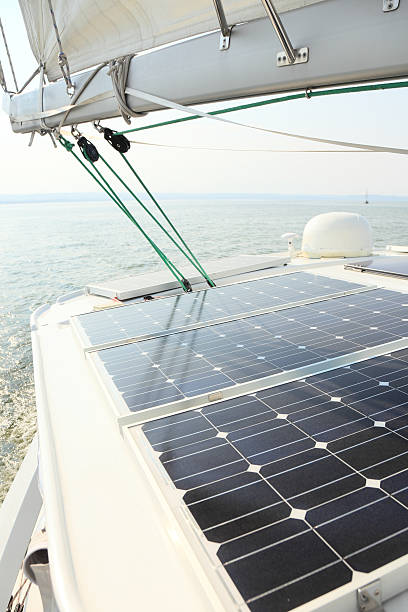 istock Solar Panels charging batteries aboard sail boat 175680462