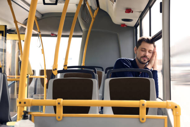 istock Tired man sleeping while sitting in public transport 1756814752