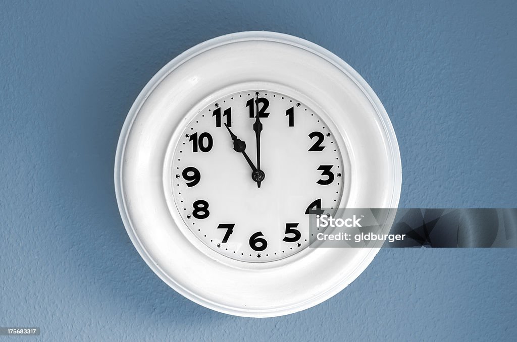 Clock at 11 o'clock A clock at 11 o'clock Blue Stock Photo