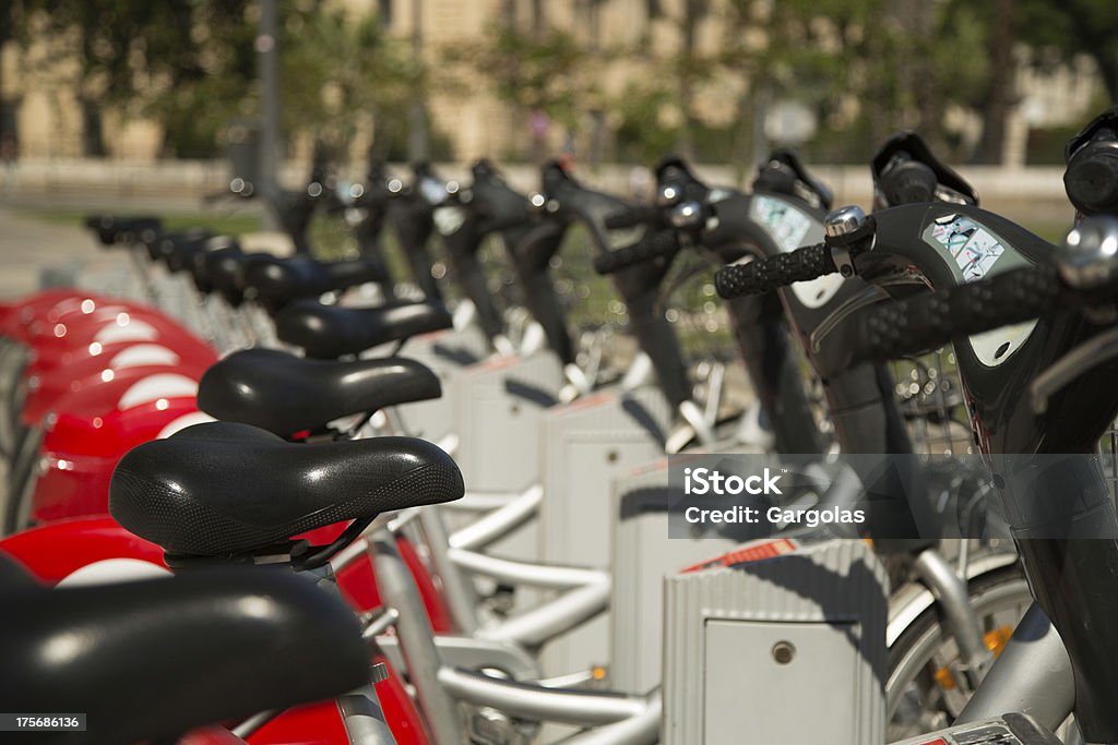 Urban bikes for rent Urban bikes in a row for rent Bicycle Stock Photo